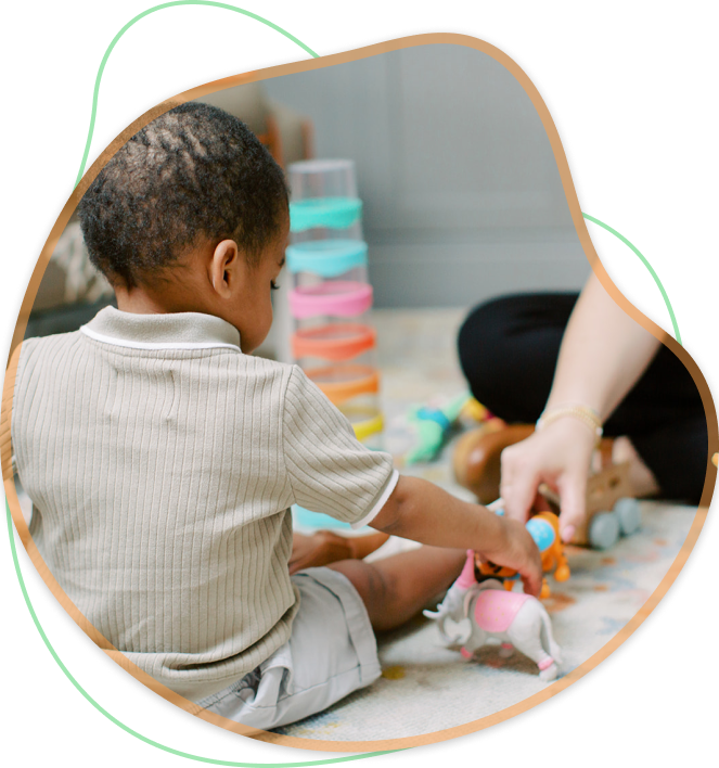 Child playing with animal figures