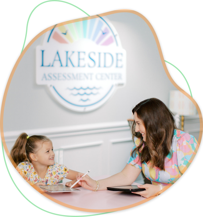 Girl & therapist with ipads