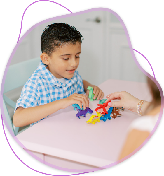 Playing with dinosaur figures
