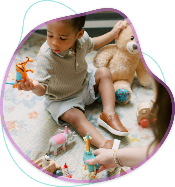 Child holding a teddy bear